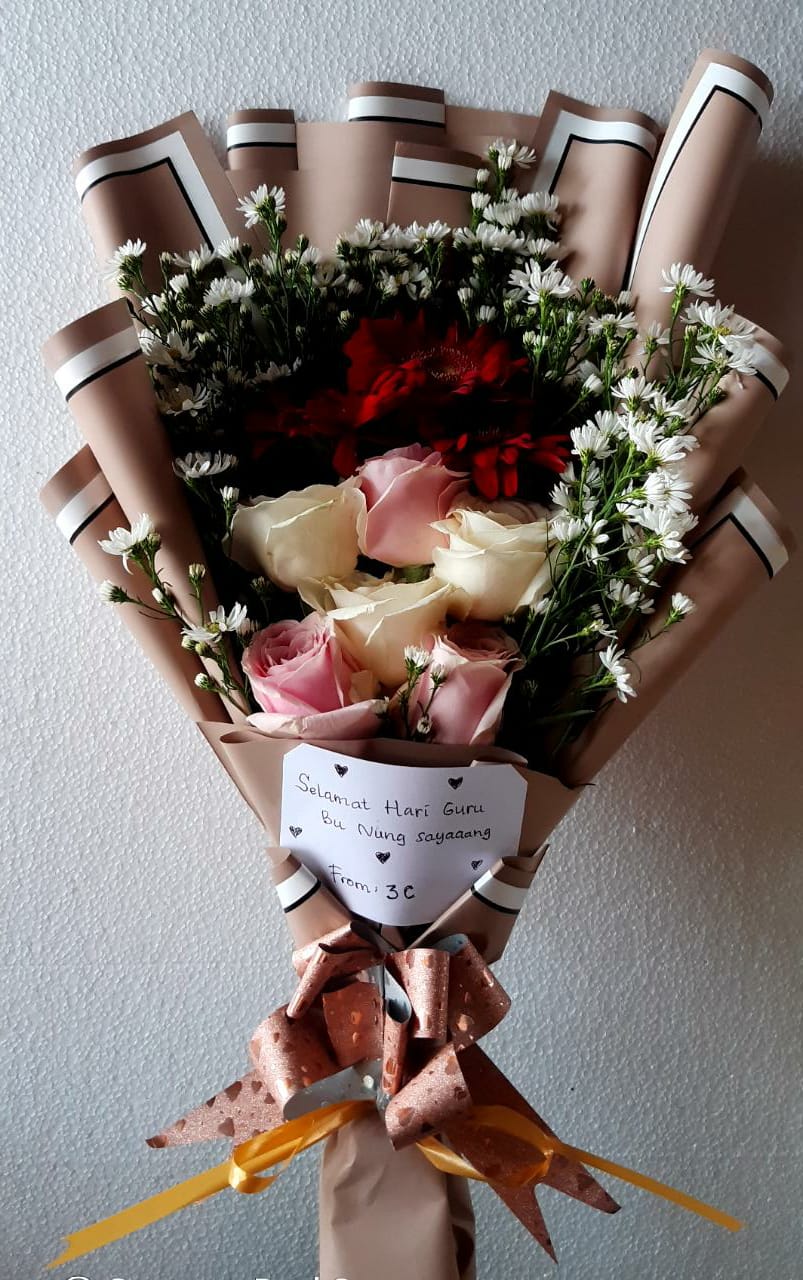bouquet of flowers for teacher's day